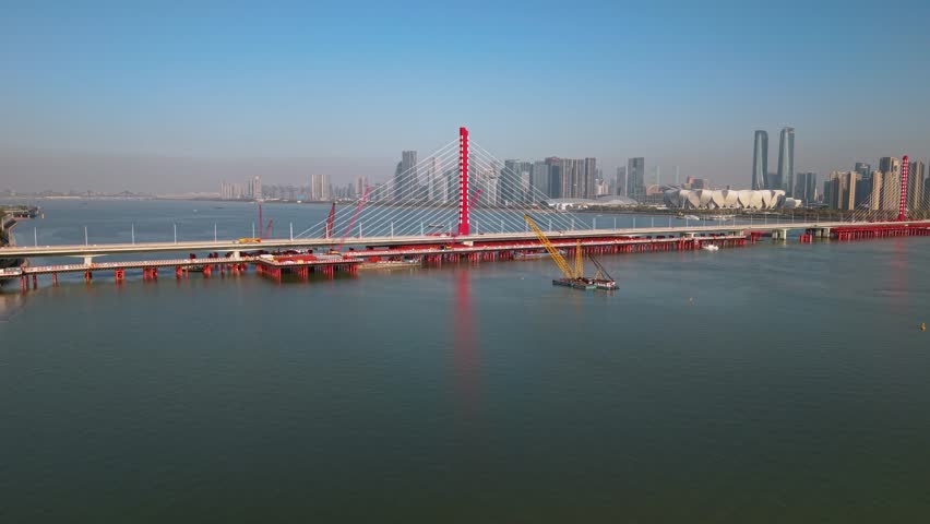 Bridge reconstruction over the Qiantang River in Hangzhou, China with skyline view during the day
