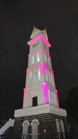 Jam Gadang Clock Tower in Bukittinggi City, West Sumatra, Indonesia, at rainy night