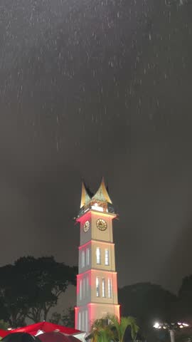 Jam Gadang Clock Tower in Bukittinggi City, West Sumatra, Indonesia, at rainy night