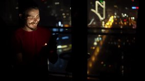 Night call visuals, Individual using hand gestures during night video call with city lights behind, Nighttime virtual meeting where participant gestures in front of illuminated cityscape background - Powered by Shutterstock - Get 15% off with code: PIKWIZARD15