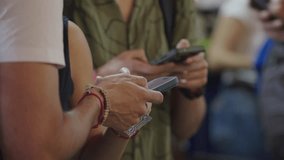 Close-ups of hands holding and using smartphones: typing, scrolling, scanning QR codes. Perfect for tech, finance, app, and communication content. - Powered by Shutterstock - Get 15% off with code: PIKWIZARD15