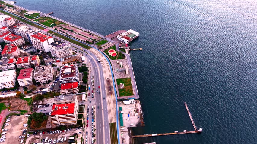 Karşıyaka, İzmir coastline, Kordon, skyscrapers rising along the seafront and the highway stretching along the coast, aerial view of the city.