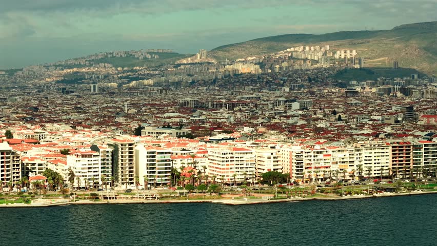 Karşıyaka, İzmir coastline, Kordon, skyscrapers rising along the seafront and the highway stretching along the coast, aerial view of the city.