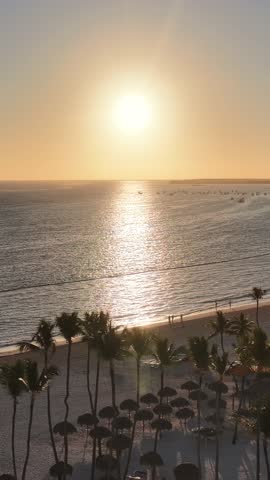 Sunrise Beach At Bavaro In Punta Cana Dominican Republic. Sunrise Skyline. Beach Landscape. Nature Seascape. Sunrise Beach In Bavaro In Punta Cana Dominican Republic. Scenic Palm Trees.
