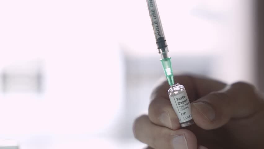 Testosterone Drawn Into Syringe From Glass Ampoule, Hormone Therapy Concept