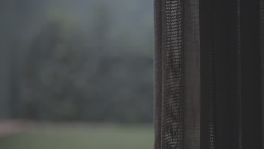 view from a window with the blurred background of a house courtyard