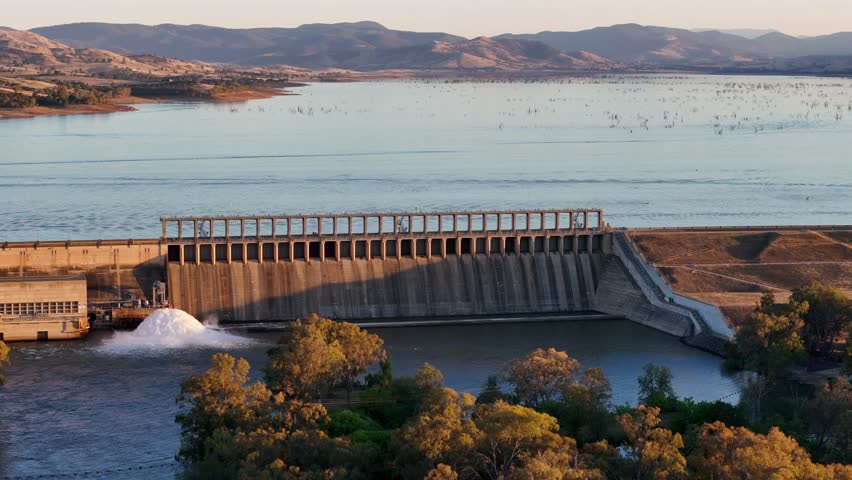 Aerial view of the Lake Hume Dam Wall in late evening sunlight