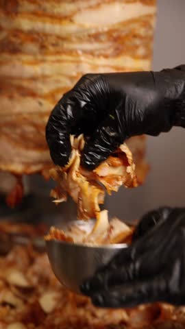 A chef makes shawarma in a café. Close-ups.