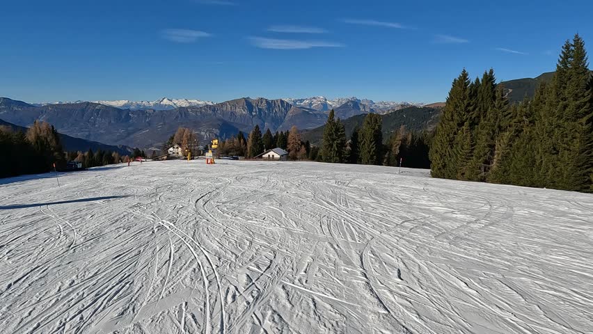 Panoramic View Of Snow Covered Ski Piste And Majestic Alpine Mountain Range Under Blue Sky Beautiful Winter Landscape Folgaria Italy