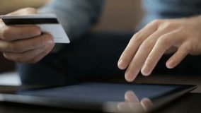 Online payment with credit card on a digital tablet, secure e-commerce transaction, modern cashless shopping and financial technology concept. - Powered by Shutterstock - Get 15% off with code: PIKWIZARD15