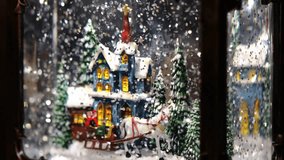 A snow globe with a Christmas scene inside. - Powered by Shutterstock - Get 15% off with code: PIKWIZARD15