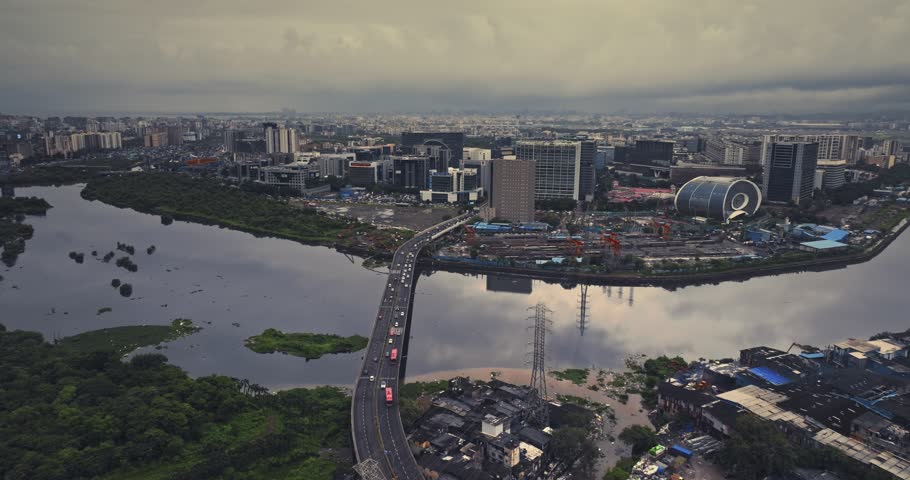 Aerial view of Bandra Kurla Complex (BKC), Mumbai, India, showcasing the city’s prominent financial and commercial district. Beautiful cloudy weather during the monsoon.
