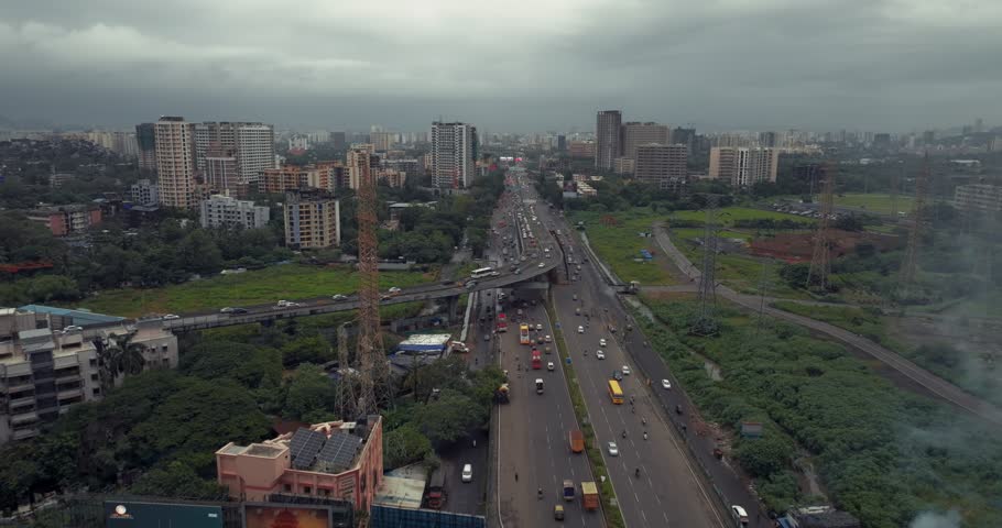 Aerial view of Bandra Kurla Complex (BKC), Mumbai, India, showcasing the city’s prominent financial and commercial district. Beautiful cloudy weather during the monsoon.