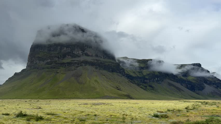 Dramatic Layered Mountain under Heavy Clouds in Remote Iceland. High quality 4k footage
