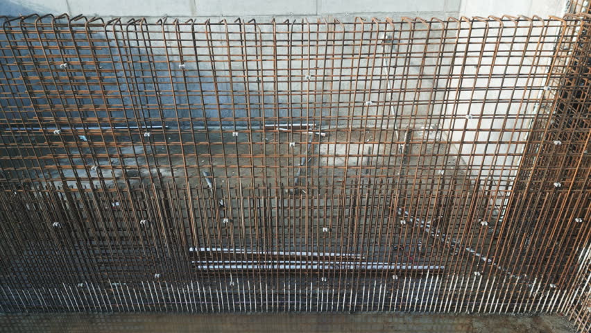 Panning video showcases a wall reinforcement on construction site