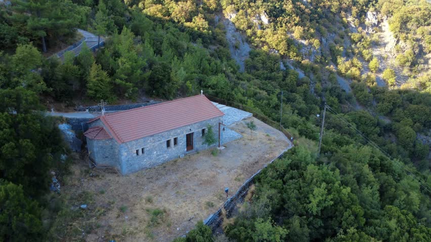 Traditional Stone Church in Mediterranean Mountain Landscape