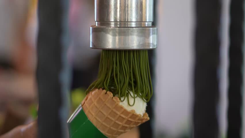 Close-up of making Matcha Mont Blanc dessert with green tea cream vermicelli