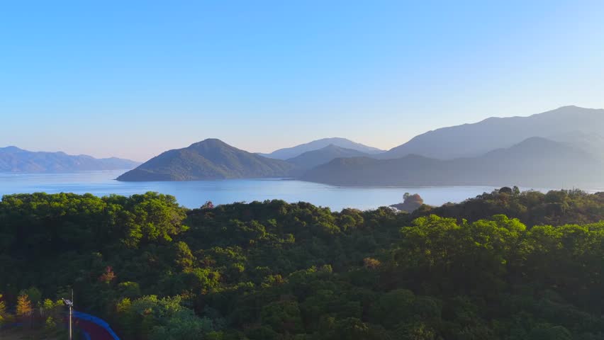Hong Kong New Territories Sha Tin Ma On Shan Wu Kai Sha Sai Sha Coastal Beach New Town Neighboring Village Development Housing Construction Outdoor Sports Environmental Greening Park Facilities, Aerial drone sunset dust gloaming skyview