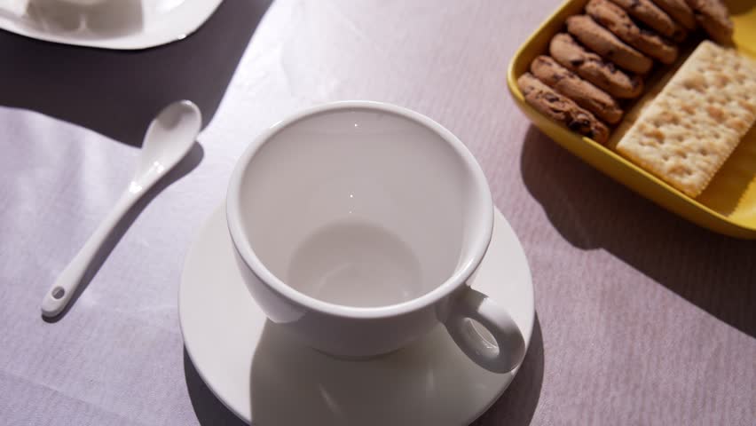 Stream Of Fresh Coffee Gently Pours Into A Cup, Bringing Rich Aroma and Soft Warmth that Create A Relaxing Mood, A Peaceful Start, and A Satisfying Morning Atmosphere