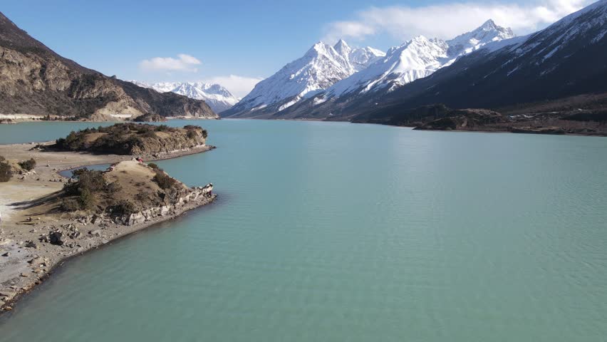 Smooth Forward Push Towards  Lake Snow-Capped Peaks, 
Tibetan Plateau, China