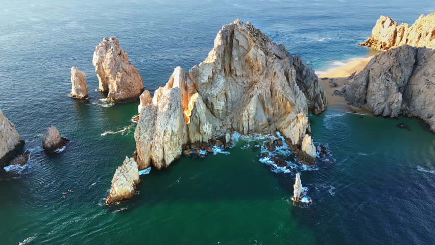 Aerial drone view of the dramatic rocky formations and turquoise waters around Land