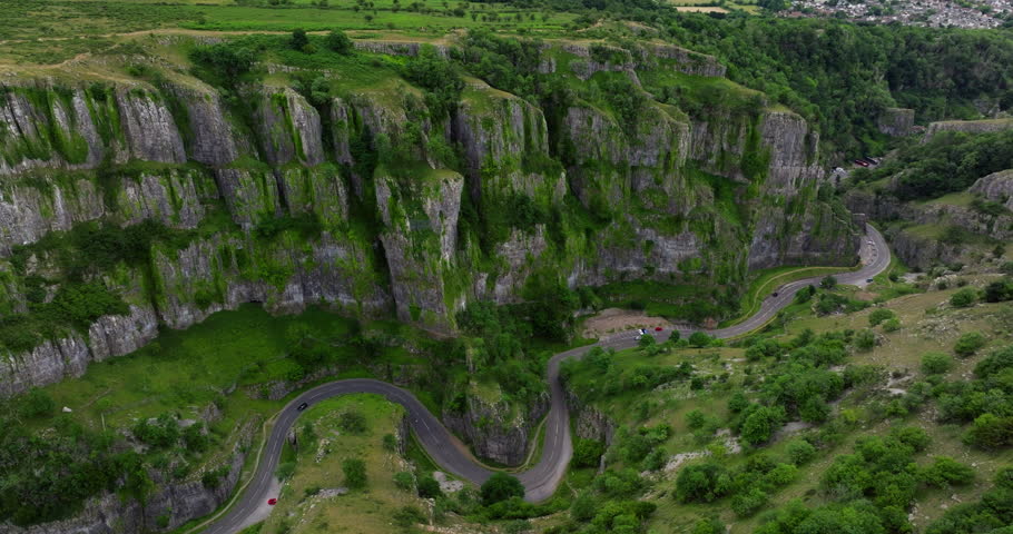 Cheddar Gorge - Winding Road Through Limestone Gorge In Mendip Hills, Cheddar, Somerset, England. - aerial shot