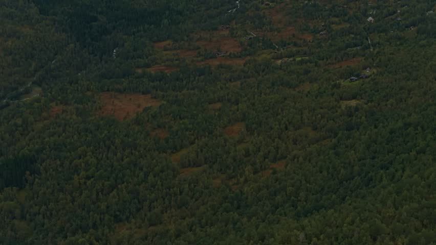 Scenic aerial view of tranquil lake nestled among Norway peaks
