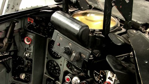 Cockpit of a captured Soviet Mig 23 Flogger.Pan tilt down from instrument panel to entire cockpit. Black and white. Used by US Military for training and exploitation and reverse engineering. 