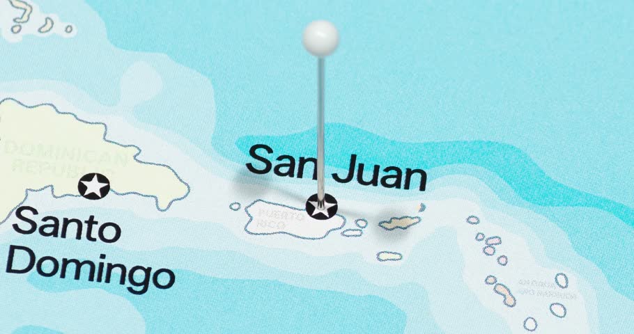 A zoom out of a white pin into san juan city of puerto rico political map