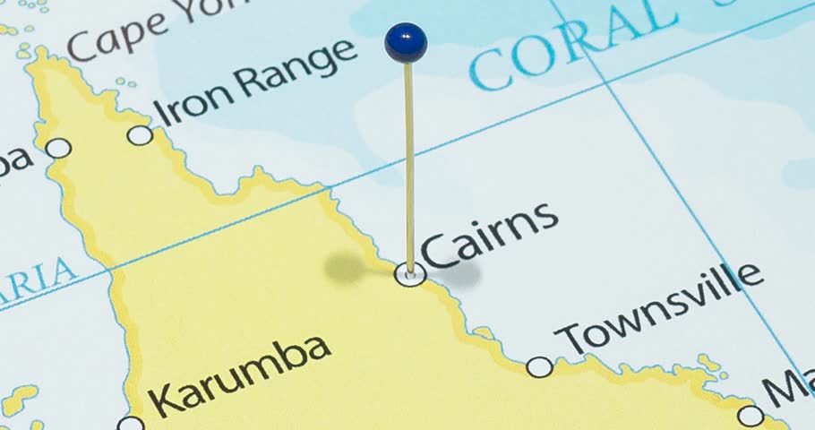 A zoom out of a blue pin into cairns city of australia political map