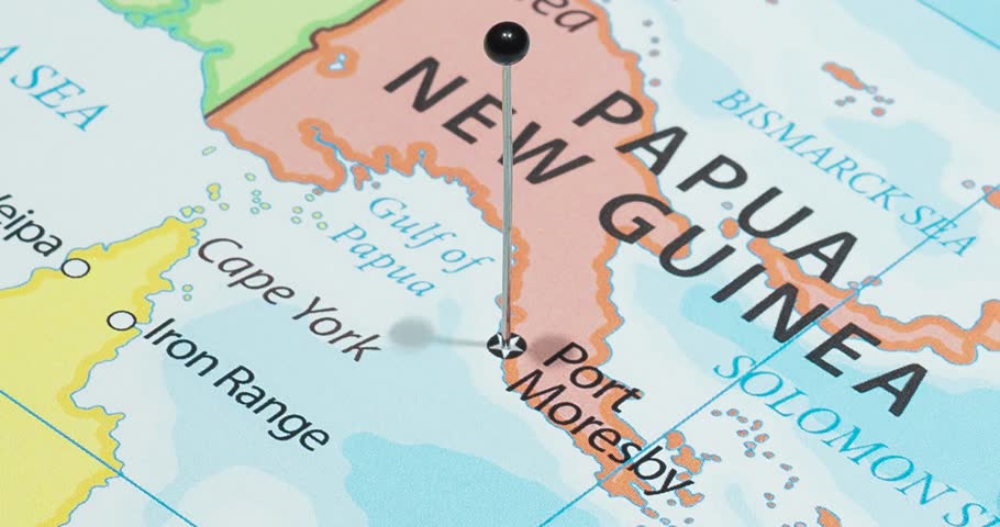 A zoom out of a black pin into port moresby city of papua new guinea political map