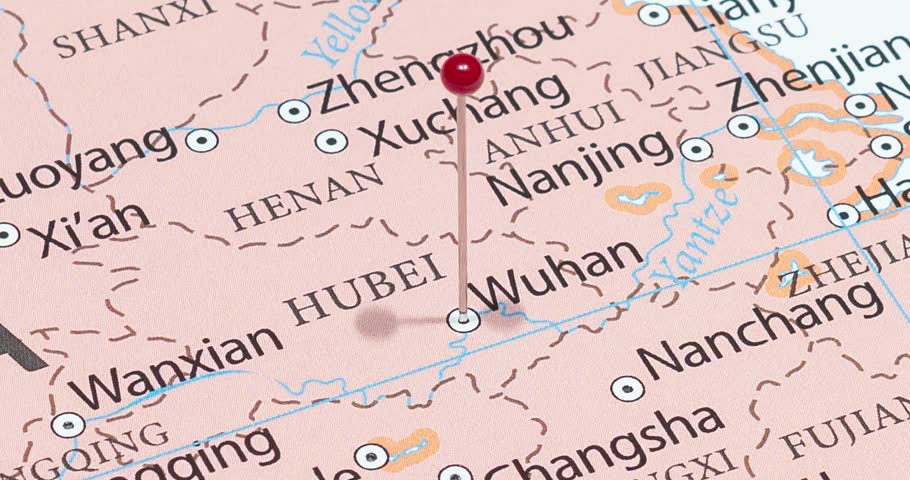 A zoom out of a red pin into wuhan city of china political map
