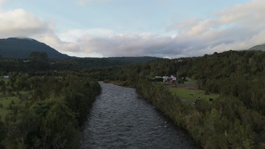 Fast Drone Flight with Parallax Effect Over River in Patagonia Chile