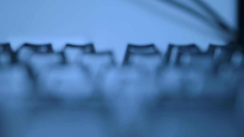 Abstract closeup of computer keyboard with blue lighting