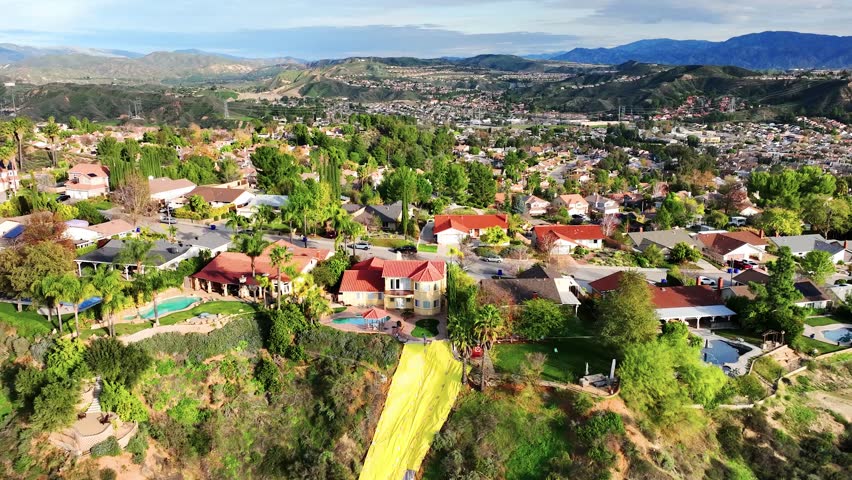 Homes destroyed by mud slides, Southern California, atmosphere river, rain, storm, tarps, aerial, landslide, 