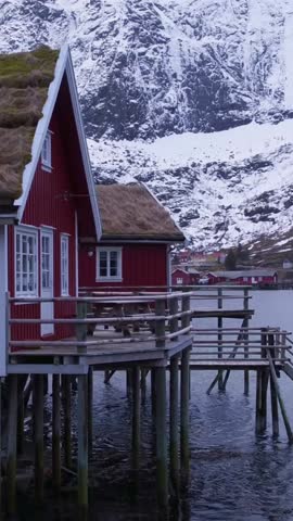 
Cinematic tracking shot of houses in Reine, Lofoten in winter 4k
