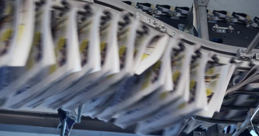 conveyor of printing newspapers in machine news press modern paper print factory