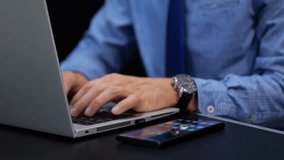 Businessman Working On Laptop Using AI Voice Assistant. - closeup shot - Powered by Shutterstock - Get 15% off with code: PIKWIZARD15