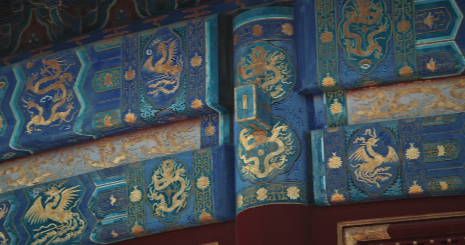 Beijing, China famous landmark Temple of Heaven. Intricate blue and gold designs adorn a traditional structure, showcasing artistic craftsmanship.