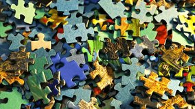 Close up view of many bright, colorful jigsaw puzzle pieces forming an abstract background. Creative concept representing problem solving, teamwork, learning and strategic thinking - Powered by Shutterstock - Get 15% off with code: PIKWIZARD15