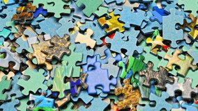 Abstract background of many bright colorful jigsaw puzzle pieces. Creative concept. Ideal for presentations, advertising, education and business visuals. - Powered by Shutterstock - Get 15% off with code: PIKWIZARD15