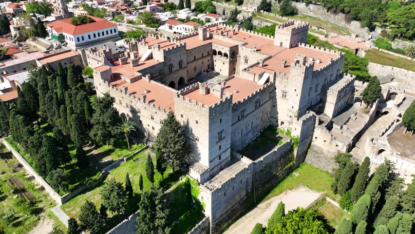 Aerial drone cinematic video of iconic Palace of the Grand Master in old fortified town of Rhodes island an Unesco World Heritage site, Dodecanese, Greece