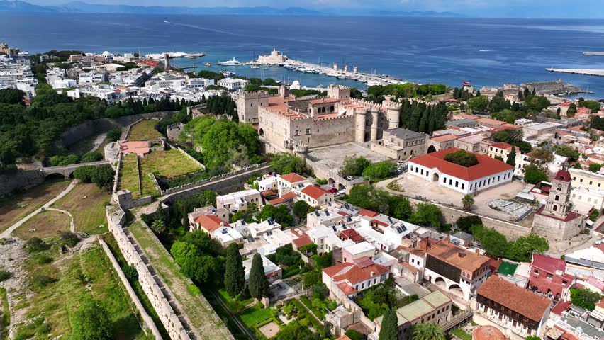 Aerial drone cinematic video of iconic Palace of the Grand Master in old fortified town of Rhodes island an Unesco World Heritage site, Dodecanese, Greece