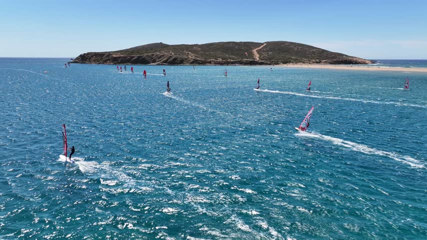 Aerial drone cineamatic video of paradise two sided beach of Prasonisi ideal for wind and kite surfing in Southeast part of Rhodes island, Dodecanese, Greece