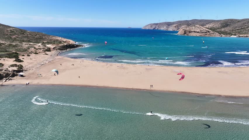 Aerial drone cineamatic video of paradise two sided beach of Prasonisi ideal for wind and kite surfing in Southeast part of Rhodes island, Dodecanese, Greece