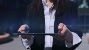 Businesswoman holding a digital tablet with a 3D hologram of a global communication network, representing technology, connectivity, and modern digital business concepts. - Powered by Shutterstock - Get 15% off with code: PIKWIZARD15