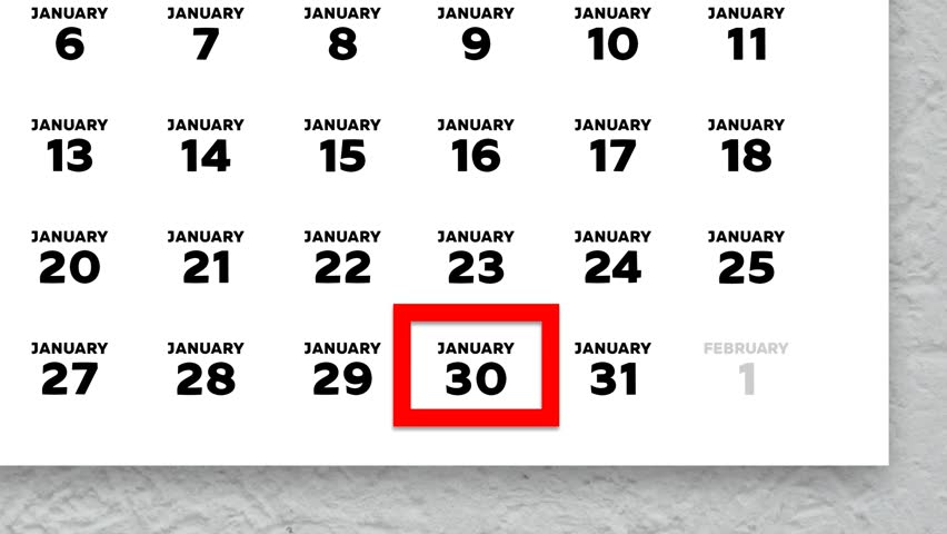 The date January 30th marked with a red cursor on the wall calendar 2026