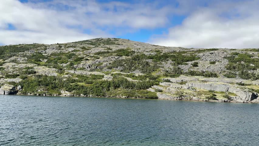 White Pass and  Yukon Railway, white rocky mountains and lakes, late August