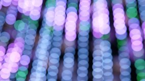 Colorful Festive Bokeh Green Purple Neon Grid Evokes Botanical Canopy, Vertical Rows Of Blurred Lights Create Rhythmic Organic Pattern Suited To Exhibition Retail Or Gallery Display - Powered by Shutterstock - Get 15% off with code: PIKWIZARD15