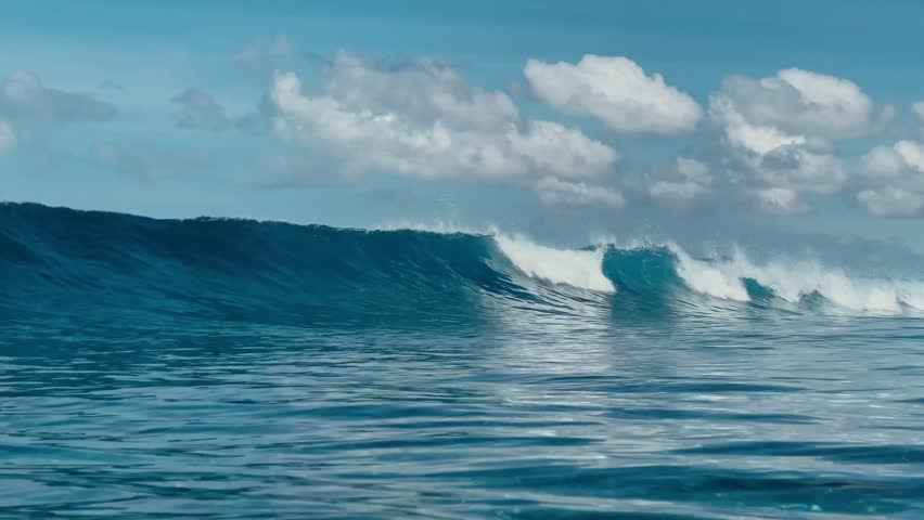 Sunny Maldives Ocean Waves Rolling Gently WideAngle SlowMotion Footage Capturing Deep Blue Barrels